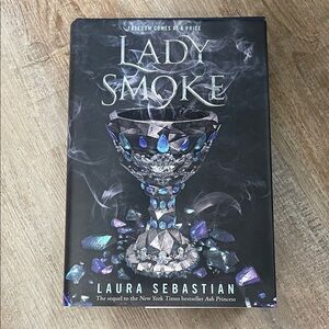 Lady Smoke by Laura Sebastian - Black Cover with Blue/Purple Accents